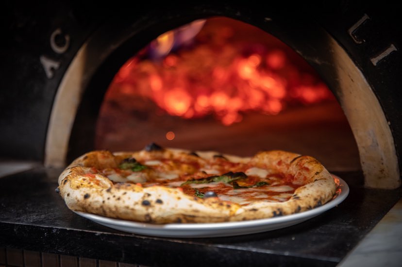 Pizza at the wood-fired oven